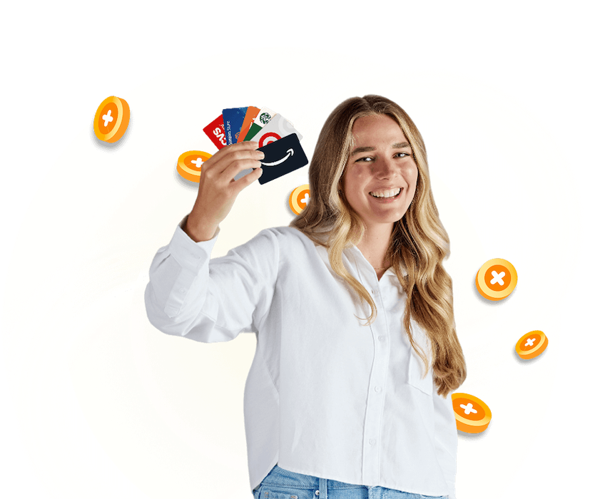 Girl holding gift cards
